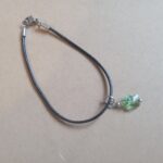 pulsera cuero- mariposa cristal
